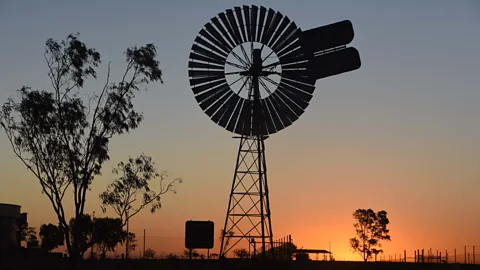 Anthony Ham Vivid sunsets, wide horizons and remote windmills are all iconic symbols of the Australian outback (Credit: Anthony Ham)