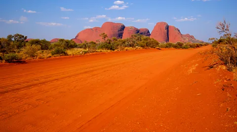 ImageBroker/Alamy The route passes near Kata Tjuta, formerly known as The Olgas (Credit: ImageBroker/Alamy)