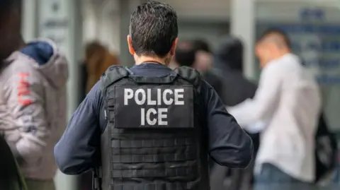 Getty Images A US Immigration and Customs Enforcement officer 