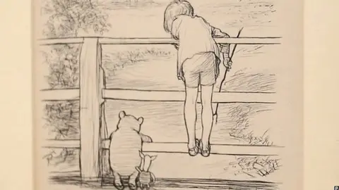 PA An illustration titled "For a long time they looked at the river beneath them…" from The House At Pooh Corner which sold at auction in 2014 for more than £300,000