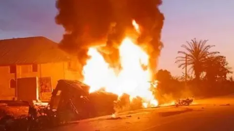 Liberia National Red Cross Society/Facebook Flames coming from the crashed fuel tanker in Liberia