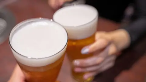 Getty Images Two pints of beer, seen from above