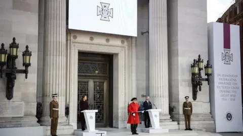 Getty Images A monument commemorating those who were awarded the Victoria Cross medal is unveiled outside the Freemasons' Hall in London