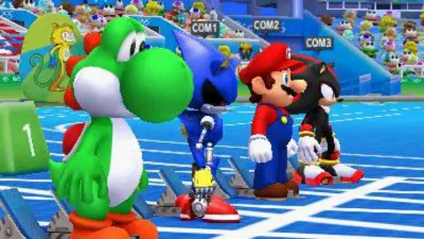 Nintendo Characters Yoshi, Metal Sonic, Mario and Shadow line up at the starting blocks of a sky-blue race track in a screenshot from an older version of the game. The graphics have fuzzy edges and less detail, giving the image a retro feel.