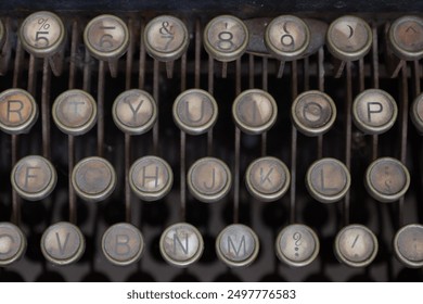 Close up vintage dusty old manual typewriter keys. Antique typewriter keys