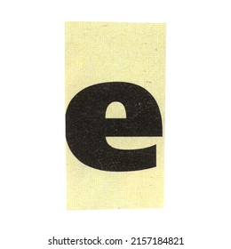 letter e magazine cut out font, ransom letter, isolated collage elements for text alphabet. hand made and cut, high quality scan. halftone pattern and texture detail. newspaper and scraps