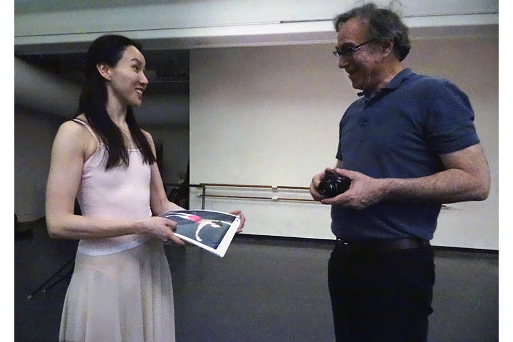   Hee Seo, Curtain Call  Marc and Hee reviewing reference photographs for sculpture 