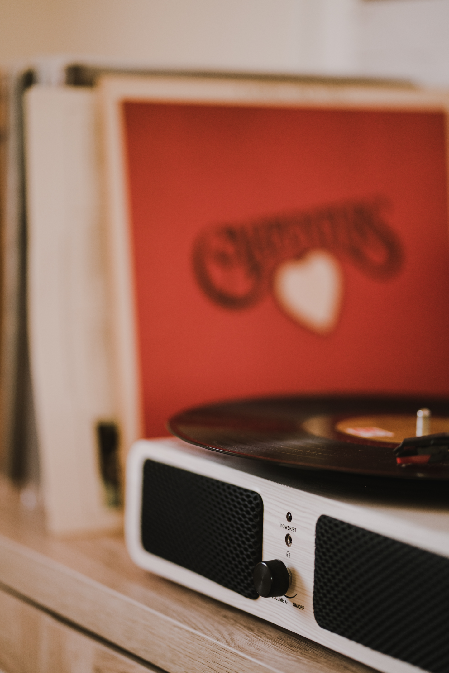 white portable turntable, vinyl music