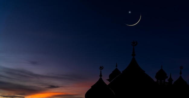 Premium Photo | Mosques dome on dark blue twilight sky and crescent ...