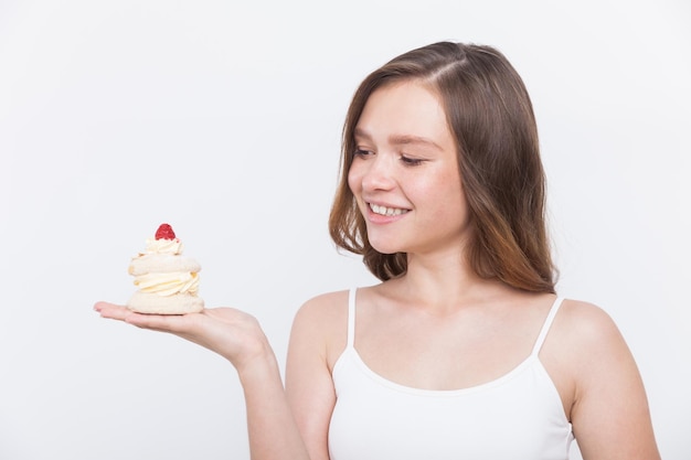 Premium Photo | Girl with creamy cupcake