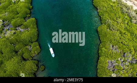 Saudi Arabia, Jazan Province, Aerial view of boat sailing through mangrove forest in Farasan Islands archipelago Stock Photo