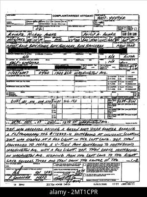 Bad boy actor Mickey Rourke was arrested at 9.30am this morning on DUI charges while driving his green scooter in South Beach. According to this arrest report, Rourke made a U-turn with red light at 12th and Washington at 4 am. Rourke had just left the C. Madeleine's Fashion Show. Rourke was booked at the Miami-Dade Pre-trial Detention Center and held on $1,000 bond. According to the arrest report, Rourke had a flushed face and bloodshot and watery eyes and that his speech was slurred when he was pulled over within a block of leaving the show and told the police officer, 'I'm not drunk, I didn Stock Photo