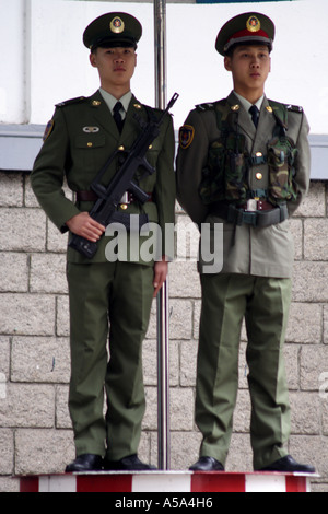 Chinese Military Guards stand watch with an automatic assault rifle Stock Photo