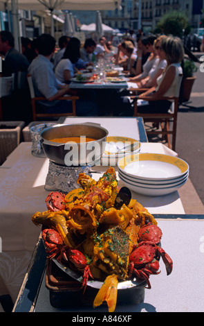 France. Marseille. Bouillabaisse served at the Miiramar Restaurant in the Vieux Port. Rigorously authentic. Clients waiting. Stock Photo