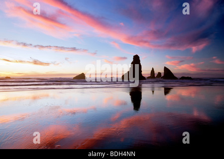 Low tide and sunset reflection at Samuel H. Boardman State Scenic Corridor. Oregon Stock Photo