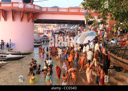 People bathing and praying in the holy Ganges River. Varanassi. India Stock Photo