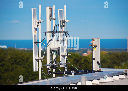 Cell antennas installed on the roof Stock Photo