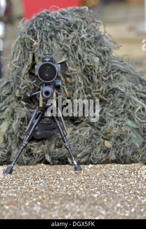 London, UK. 26th Oct, 2013. Rifleman Mitchell, a sniper from The Rifles light infantry regiment wearing a camouflage ghillie suit at the Reserves recruitment event on Horse Guards Parade. © Michael Preston/Alamy Live News Stock Photo