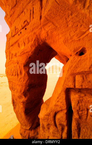 Natural arch framing distant peak, Saudi Arabia, desert areas near Riyadh Stock Photo