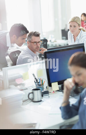 Business people working at computer in office Stock Photo