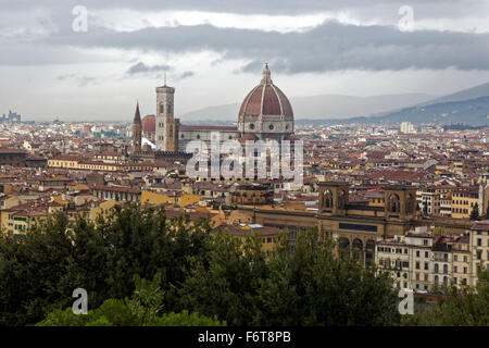 The Duomo of the Cattedrale di Santa Maria del Fiore, or Cathedral of Saint Mary of the Flower dominates the skyline of Florence Stock Photo