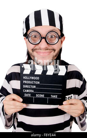 Funny prison inmate with movie board isolated on white Stock Photo