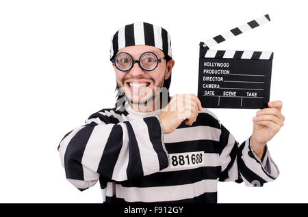 Funny prison inmate with movie board isolated on white Stock Photo