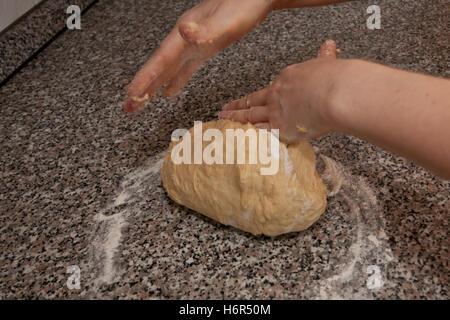 woman hand hands dough knead leavened dough food aliment hand hands boil cooks boiling cooking pastries wooden board bake stir Stock Photo