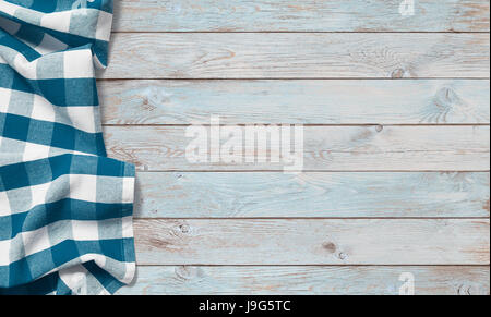 blue picnic cloth on wood table Stock Photo