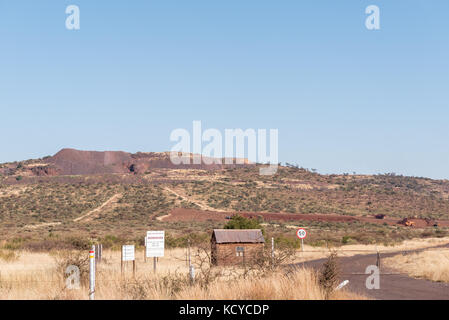 POSTMASBURG, SOUTH AFRICA - JULY 7, 2017: Entrance to the Morokwa manganese mine on the R386-road between Olifantshoek and Postmasburg in the Northern Stock Photo