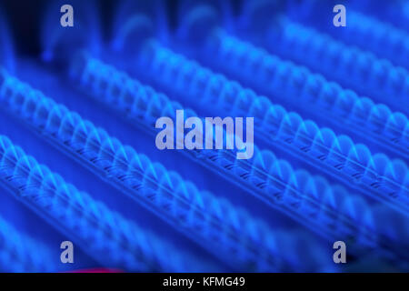 Propane flame inside of gas boiler furnace Stock Photo