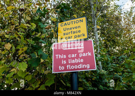 Flood warning sign at a car park, UK Stock Photo