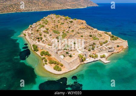 Aerial drone view of the former ancient fortress and leper colony island of Spingalonga on the Greek island of Crete Stock Photo