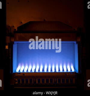 Gas flame inside of the gas boiler Stock Photo