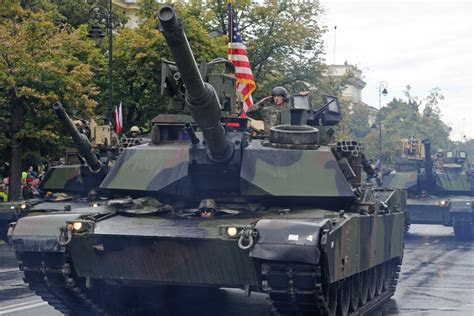 tanks join polish parade  show  military presence