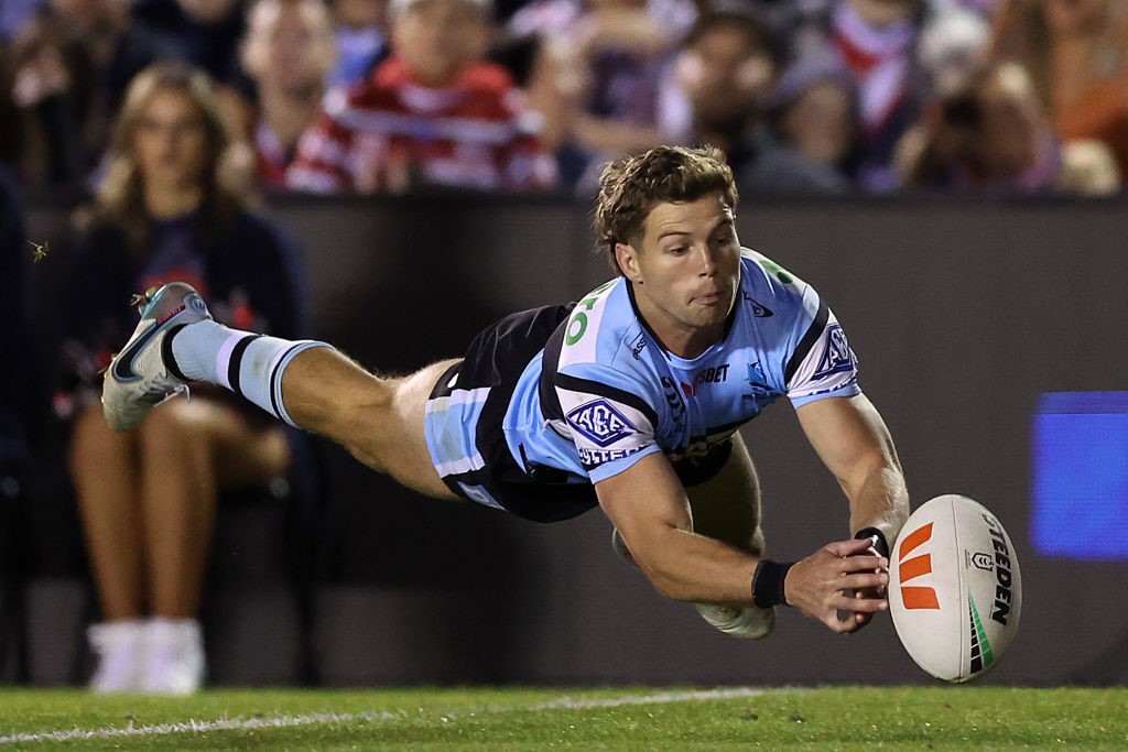 Blayke Brailey tries to catch a ball during an NRL.