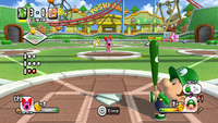 Baby Luigi prepares to bat in Mario Super Sluggers.