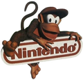 Diddy Kong holds the Nintendo logo