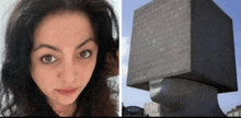 a woman with a cube on her head next to a building