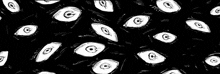 a black and white drawing of many eyes on a black background