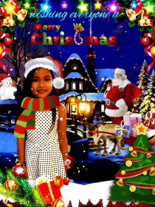 a little girl in a santa hat stands in front of a merry christmas greeting card