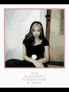 a poster for blackpink 's summer diary in seoul shows a girl in a black shirt