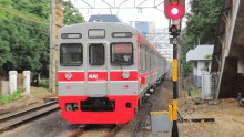 a red and gray train with the word kai on it