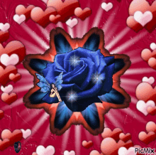 a blue rose with a fairy on it is surrounded by pink hearts