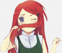 a girl with red hair and blue eyes is covering her mouth with her hair