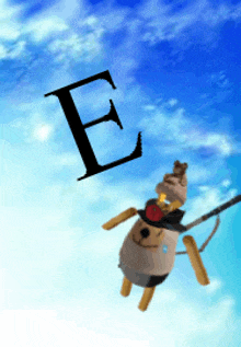 a cartoon dog is flying through the air with the letter e behind it