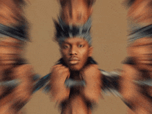 a blurry picture of a man 's face with a crown on his head