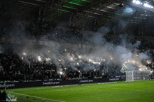 a soccer field with a banner that says swedish prem on it