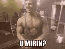 a muscular man in a gym with the words u mirin written on his chest