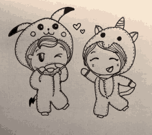 a black and white drawing of a boy and a girl dressed in animal costumes